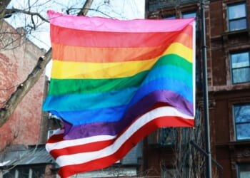 A "pride" flag flies in front of The American Flag at the Stonewall National Monument in New York City on Feb. 12, 2026.