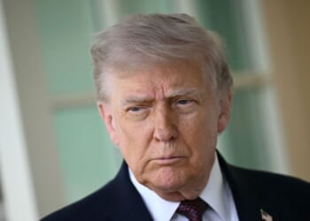 President Donald Trump speaks to reporters outside the Oval Office of the White House in Washington, DC on April 13, 2026.