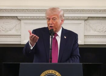 President Donald Trump makes remarks as he hosts NCAA champion athletes during a NCAA Collegiate National Champions Day event in the State Dining Room at the White House on April 21, 2026, in Washington, D.C.
