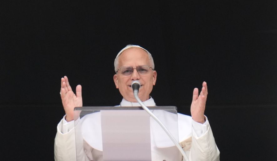 Pope Leo XIV delivers the Regina Coeli prayer in St. Peter's Square at the Vatican, Sunday, April 12, 2026. (AP Photo/Gregorio Borgia)