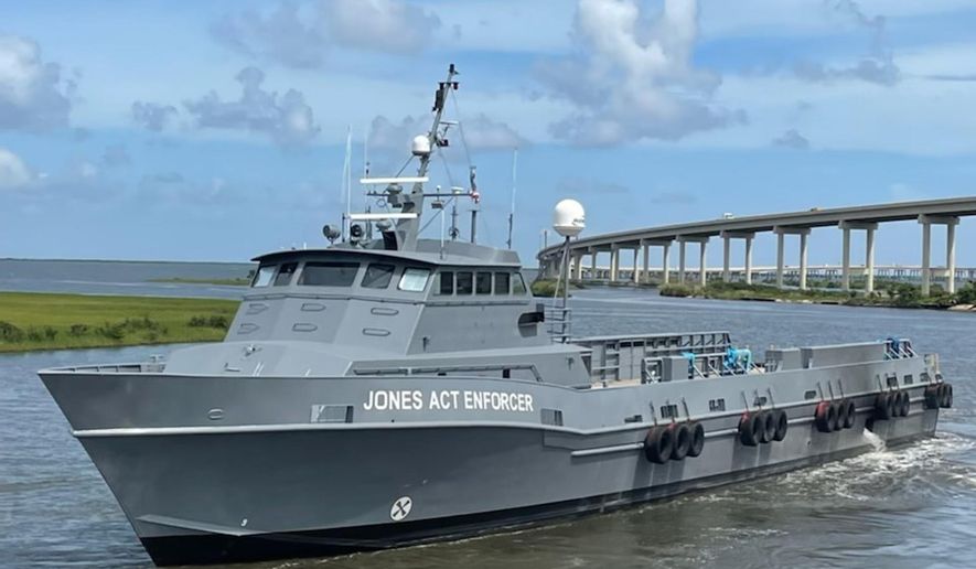 This image provided by the Offshore Marine Service Association shows the patrol vessel, the Jones Act Enforcer, in Leeville, La., on July 15, 2021. The Offshore Marine Service Association has launched the ship to gather photos and videos of ships it considers to be violating a 1920 law requiring U.S. vessels to carry cargo between U.S. locations. It will provide such evidence to enforcement agencies and to trade publications, said Aaron Smith, president and CEO of the association. (Eli Autin/Offshore Marine Service Association via AP) ** FILE **