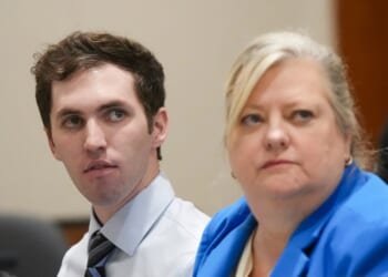 Tyler Robinson, left, accused in the fatal shooting of Charlie Kirk, sits beside defense attorney Kathryn Nester during a hearing in Fourth District Court on Jan. 16, 2026, in Provo, Utah.