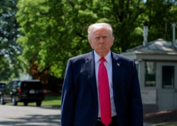 President Donald Trump walks over to speak to the media before boarding Marine One on the South Lawn of the White House on April 16, 2026, in Washington, D.C.