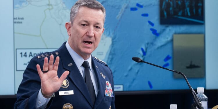Chairman of the Joint Chiefs of Staff Gen.Dan Caine speaks as a map of the Strait of Hormuz is displayed during a media briefing Thursday at the Pentagon in Washington, D.C.
