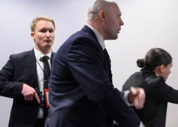 Agents draw their firearms after a shooting took place at the White House Correspondents' dinner at the Washington Hilton in Washington, DC on April 25, 2026.