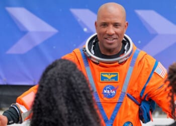 Pilot Victor Glover speaks to his family as he walks out of the Neil A. Armstrong Operations and Checkout Building just before the launch of Artemis II at NASA's Kennedy Space Center on April 1, 2026.