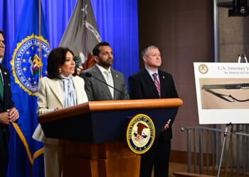 Jeanine Pirro, Kash Patel, and Darren Cox at a press conference