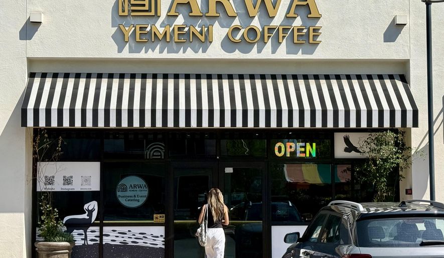 A customer enters Arwa Yemeni Coffee on April 6, 2026, in Sunnyvale, Calif. (AP Photo/Haven Daley)