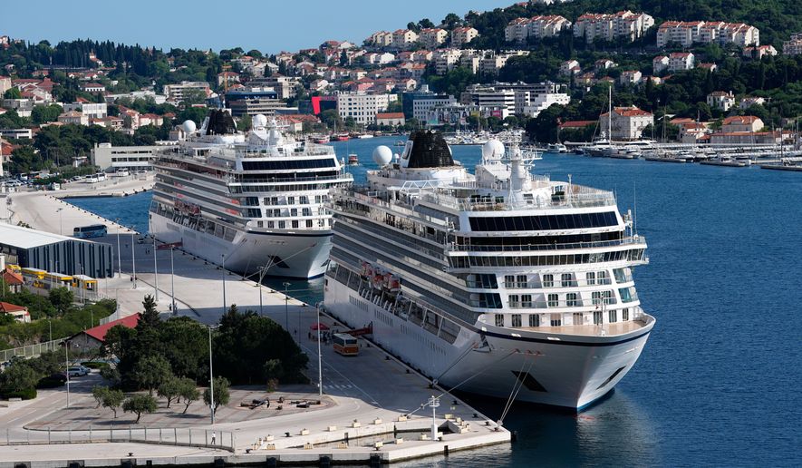 Cruise ships are moored in the port of Dubrovnik, Croatia, Wednesday, April 29, 2026. (AP Photo/Darko Bandic)