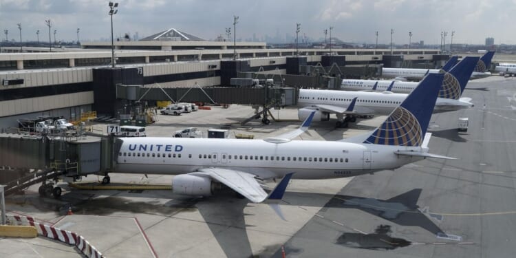 United Airlines flight collides with Baltimore delivery truck during landing in New Jersey