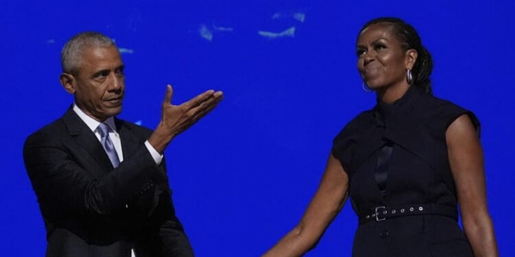 Barack Obama blames staying in politics for causing his marital woes