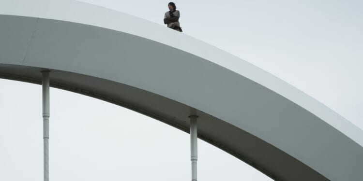 Antiwar protester comes down from D.C.’s Frederick Douglass Memorial Bridge