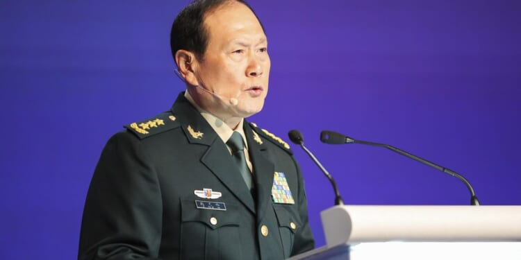 China gives suspended death sentences to two former defense ministers accused of bribery