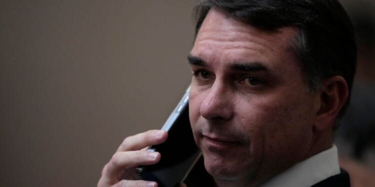 Brazil presidential hopeful Flavio Bolsonaro denies wrongdoing after asking banker for millions