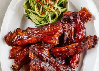 Slow-cooked, sticky-glazed pork ribs go with cucumber slaw in Sam Way’s recipe
