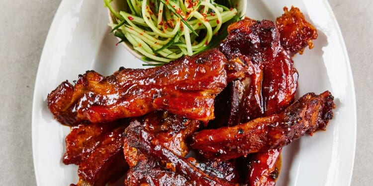 Slow-cooked, sticky-glazed pork ribs go with cucumber slaw in Sam Way’s recipe