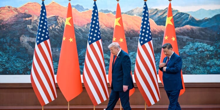 Trump offers platitudes while Xi warns of possible confrontation during China summit