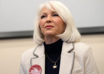 Colorado’s Democratic governor commutes ex-election clerk Tina Peters’ sentence after Trump pressure