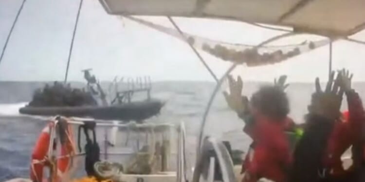 Israeli troops intercept vessels from a flotilla trying to breach the blockade of Gaza