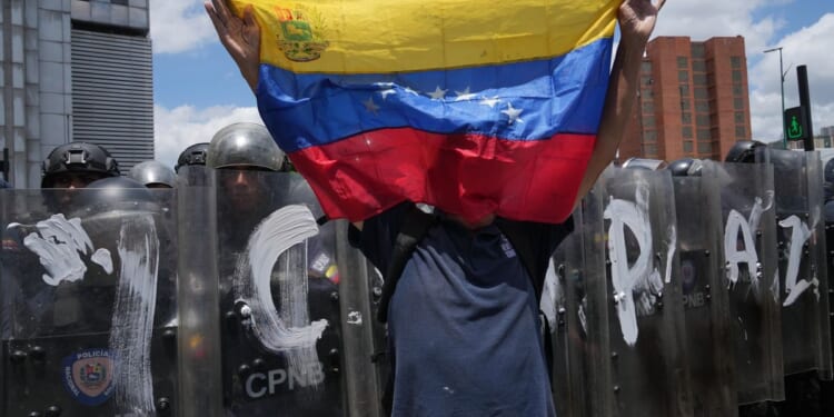 Students protest in Venezuela after deaths of political prisoner and his mother