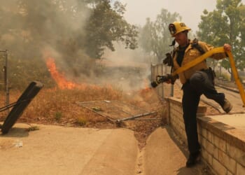Thousands ordered to evacuate as Southern California wildfire threatens homes