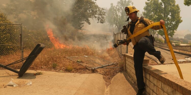 Thousands ordered to evacuate as Southern California wildfire threatens homes