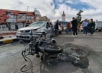 Blast outside a Syrian defense ministry building kills a soldier, wounds 12 people