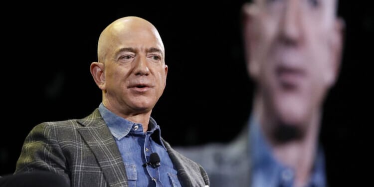 Bezos calls for eliminating income taxes on bottom half of earners