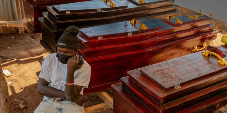 Congo curtails funeral wakes in Ebola outbreak as WHO upgrades risk assessment