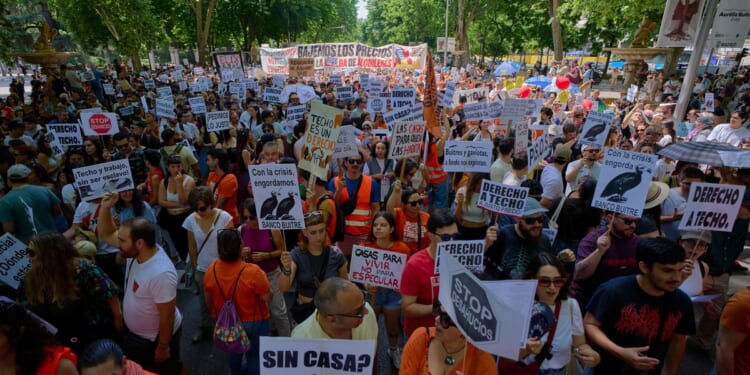 Thousands in Spain’s capital protest increasing housing costs