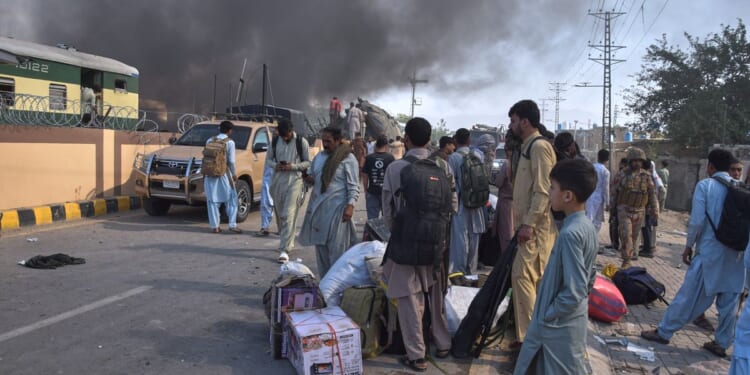 A suicide bombing near a railway track in southwest Pakistan kills at least 23 people