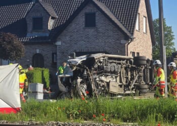 Four dead, five hurt in a crash between a train and a school bus, Belgian officials say