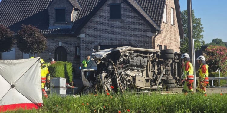 Four dead, five hurt in a crash between a train and a school bus, Belgian officials say