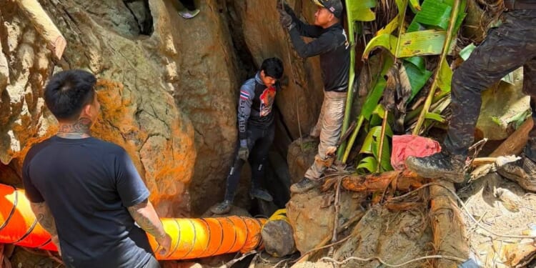 Search continues for seven villagers trapped in a flooded Laos cave