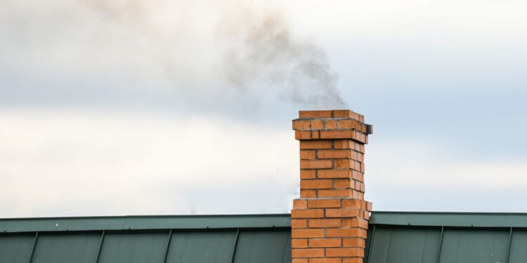 Man arrested in Washington state after getting stuck in chimney of boarded-up house