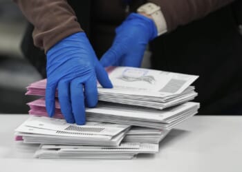 Postal service reveals plan to enforce Trump’s citizenship voting order