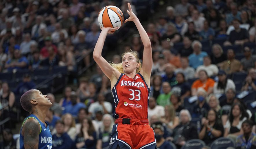 Washington Mystics guard Lucy Olsen (33) shoots over Minnesota Lynx guard Courtney Williams (10) during the second half of a WNBA basketball game Thursday, July 3, 2025, in Minneapolis. (AP Photo/Abbie Parr) **FILE**