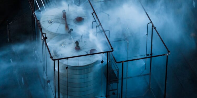 Chemical tanks are sprayed with water as authorities monitor the area for leaks in Garden Grove, CA on May 22, 2026.