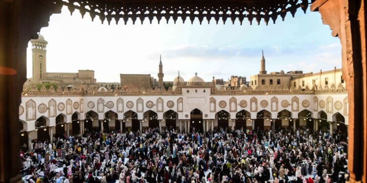 Muslims gather to take part in a special morning prayer at the Al-Azhar Mosque in Cairo on May 27, 2026, to start Eid al-Adha, the Feast of Sacrifice, marking the end of the annual Hajj pilgrimage to Mecca.