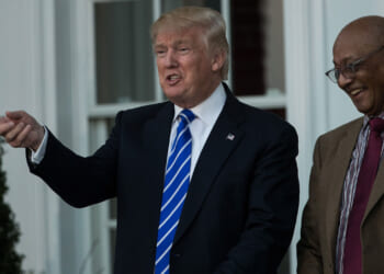 Donald Trump shares a laugh with civil rights icon Bob Woodson.