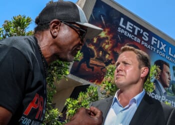 Los Angeles Mayoral candidate Spencer Pratt meets with a concerned citizen during a campaign "block party" event May 20.