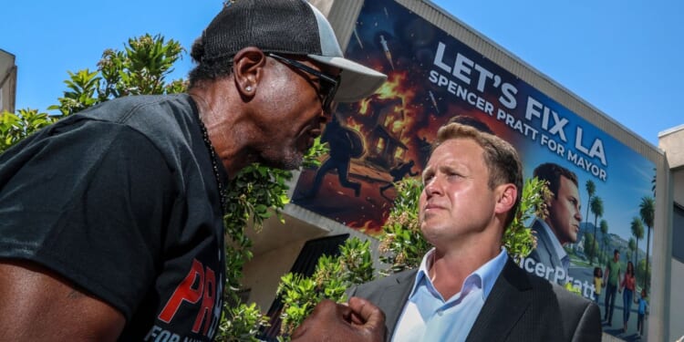 Los Angeles Mayoral candidate Spencer Pratt meets with a concerned citizen during a campaign "block party" event May 20.