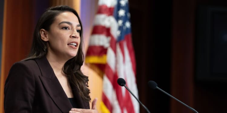 Rep. Alexandria Ocasio-Cortez speaks at a press conference to announce the Artificial Intelligence Data Center Moratorium Act at the U.S. Capitol on March 25, 2026, in Washington, D.C.