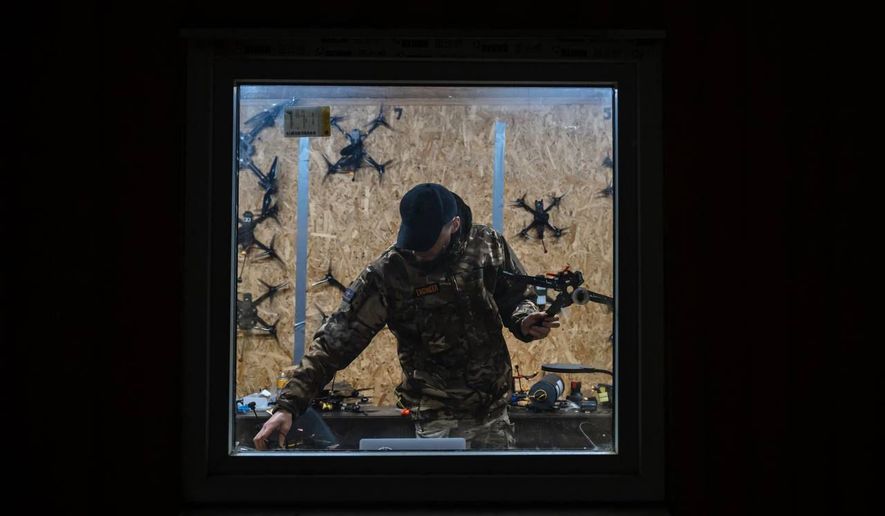 Besides learning to fly, students at Killhouse learn how to fix the drones if they break. Guillaume Ptak / The Washington Times