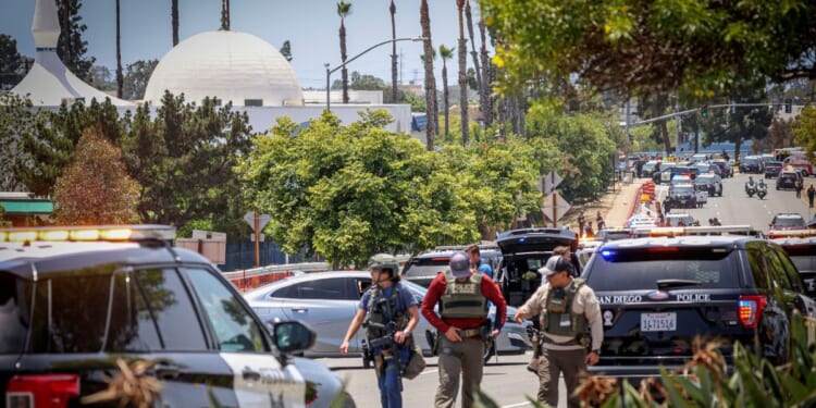 Multiple people were killed, including an armed security guard, after two shooters entered Islamic Center in San Diego on Monday, May 18, 2026, and opened fire.