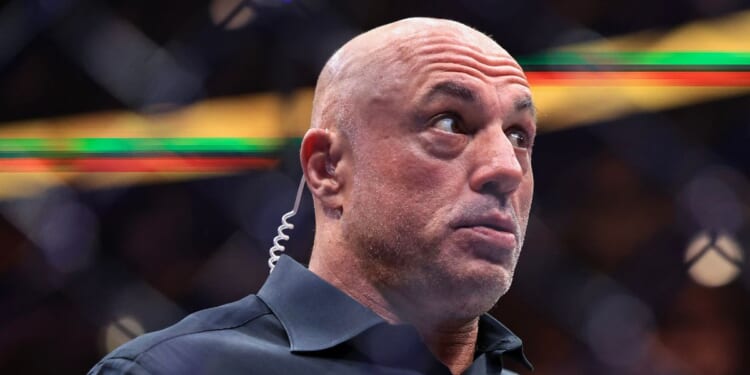 Joe Rogan reacts after a middleweight title bout between Dricus du Plessis of South Africa and Khamzat Chimaev of the United Arab Emirates in UFC 319 at the United Center on Aug. 16, 2025, in Chicago, Illinois.