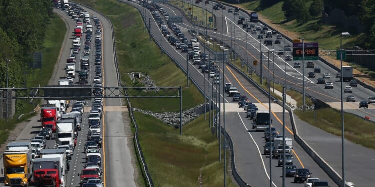Heavy Memorial Day traffic moves southbound and northbound along I-95 on May 22, 2015, in Quantico, Virginia.
