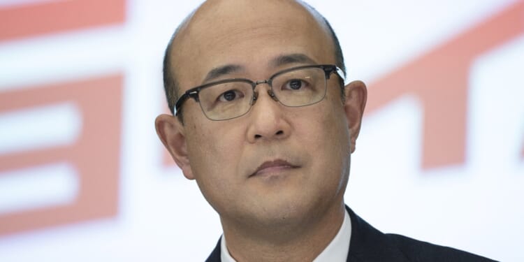 Kenta Kon seated