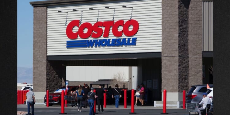A Costco Wholesale logo is displayed at a warehouse in Las Vegas, Nevada, in a file photo from March.