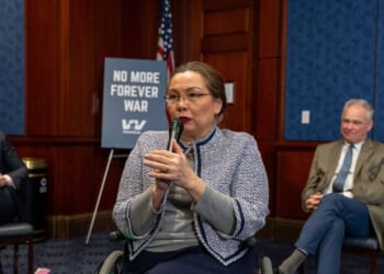Sen. Tammy Duckworth speaks with veterans about the Iran war at Capitol Hill on March 18, 2026, in Washington, D.C.